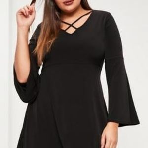 Slinky black dress with flare sleeves